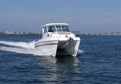 World cat boats - The 280CC-X offers dramatic styling, superior performance, and the smooth ride you expect from World Cat. Designed exclusively via CAD technology, the 280CC-X features luxurious appointments, generous seating for 11, …